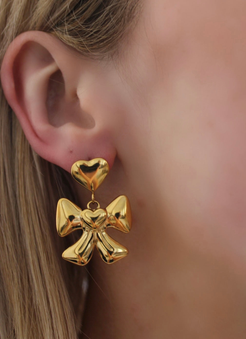 gold stainless steel bow earrings 